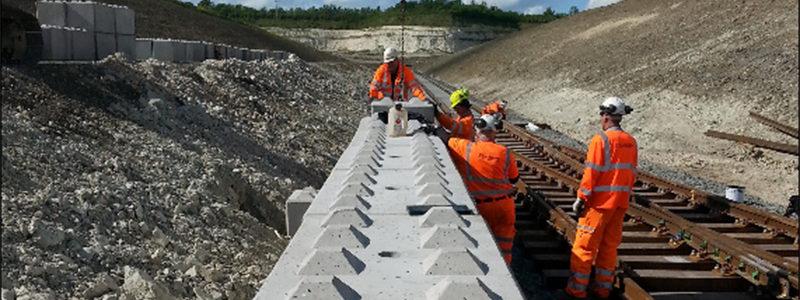 Elite Precast Concrete employees working alongside railway